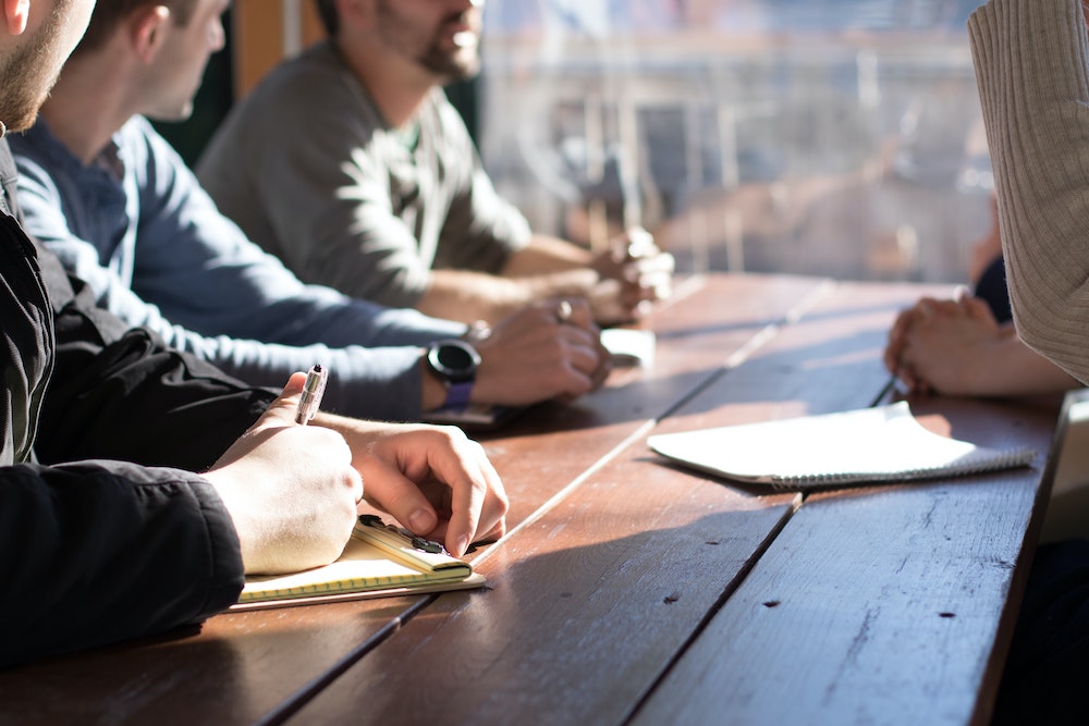 Business leaders reviewing technology costs and risks for Outsourced IT Support London
